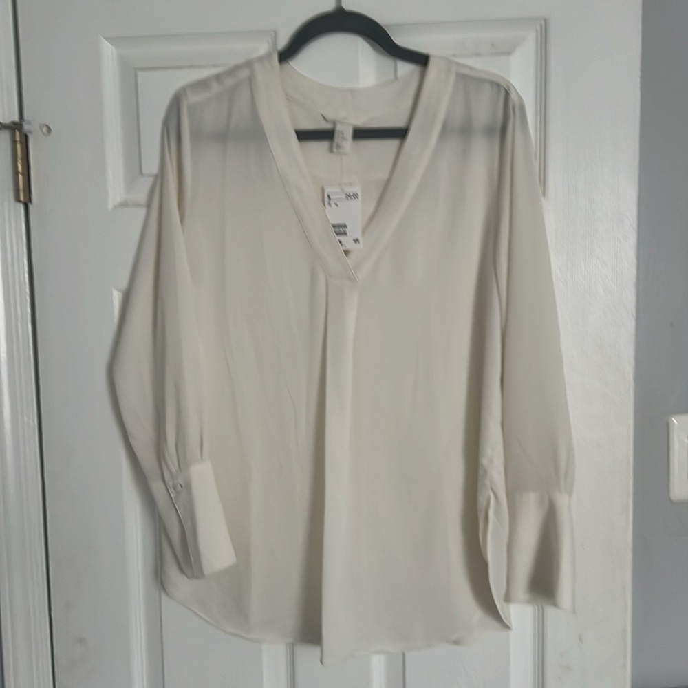 H&M cream colored blouse, Size 12. NWT. Smoke free clean home.
